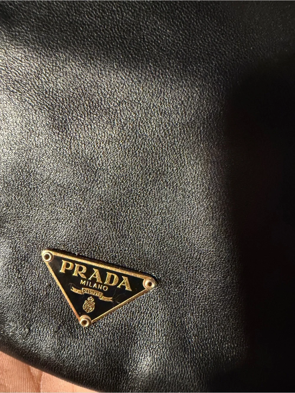 Prada Black Leather Hobo with Gold Chain Accent and dust bag .